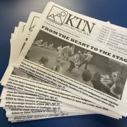 a stack of Kootenay Teen News papers arranged in a fan shape