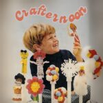 A vintage picture of a child crafting under the word crafternoon